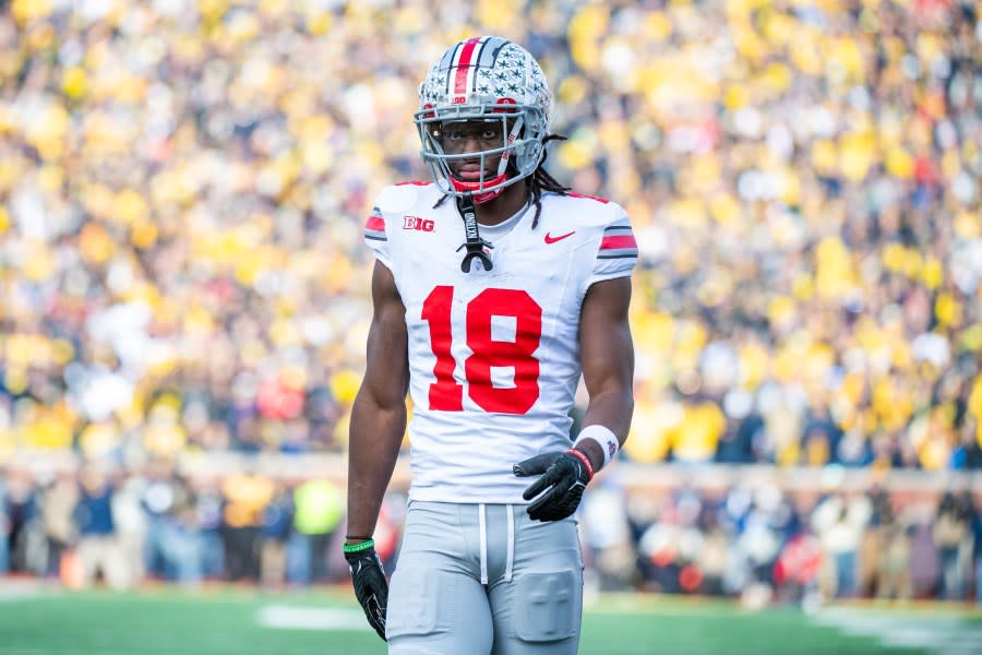 ANN ARBOR, MICHIGAN – NOVEMBER 25: Marvin Harrison Jr. #18 of the Ohio State Buckeyes walks up the field during the second half of a college football game against the Michigan Wolverines at Michigan Stadium on November 25, 2023 in Ann Arbor, Michigan. The Michigan Wolverines won the game 30-24 to win the Big Ten East. (Photo by Aaron J. Thornton/Getty Images)