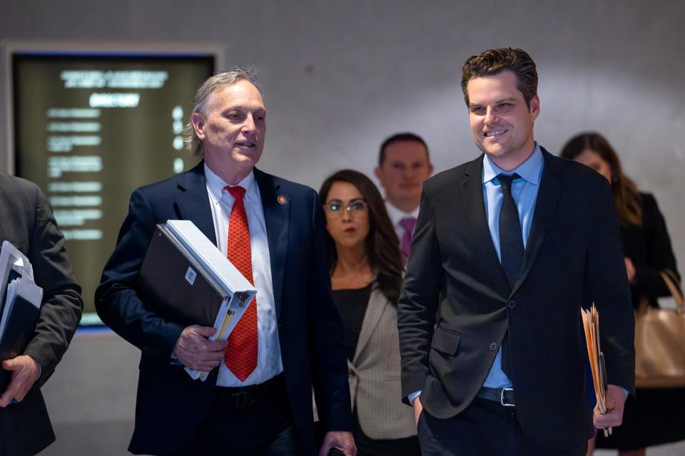 House Oversight and Accountability Committee member Rep. Andy Biggs, R-Ariz., left, and House Judiciary Committee member Rep. Matt Gaetz, R-Fla., right, leave the O'Neill House Office Building following a closed-door deposition with Hunter Biden, son of President Joe Biden, on Capitol Hill in Washington, Wednesday, Feb. 28, 2024.