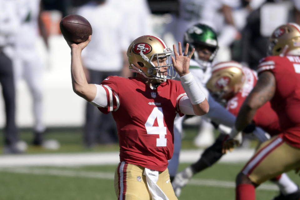 San Francisco 49ers quarterback Nick Mullens (4) throws a pass during the second half of an NFL football game against the New York Jets, Sunday, Sept. 20, 2020, in East Rutherford, N.J. With Jimmy Garoppolo likely sidelined by a sprained ankle, Mullens appears set to get his first start at quarterback for the Niners in nearly 21 months, against the New York Giants. (AP Photo/Bill Kostroun)