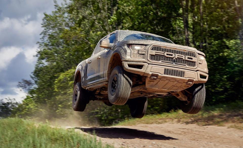 <p>Remember earlier in this roundup, when we mentioned how the Ford F-150 Raptor's natural habitat is someplace dirty, hilly, and filled with jumps? Here, our crew-cab Raptor SuperCrew was given a proper airborne send-off at <a rel="nofollow noopener" href="https://www.caranddriver.com/reviews/2017-ford-f-150-raptor-reliability-maintenance" target="_blank" data-ylk="slk:the end of its 40,000-mile long-term test;elm:context_link;itc:0;sec:content-canvas" class="link ">the end of its 40,000-mile long-term test</a>. We jumped it a lot during its stay with us. </p>