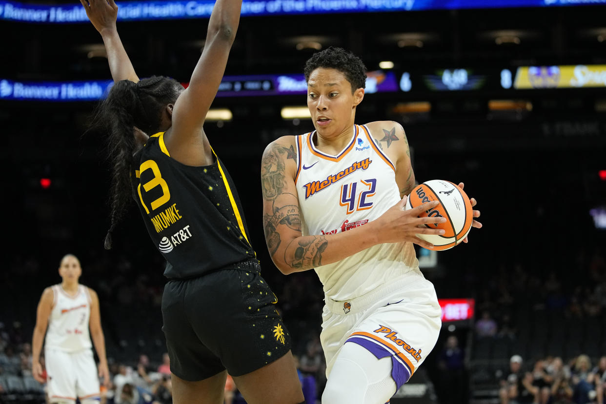 Phoenix Mercury center Brittney Griner drives during the first half of a WNBA preseason game against the Los Angeles Sparks on May 12, 2023, in Phoenix. (AP Photo/Matt York)