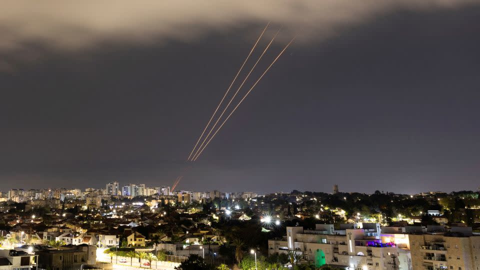 An anti-missile system operates after Iran launched drones and missiles towards Israel, as seen from Ashkelon, Israel. - Amir Cohen/Reuters