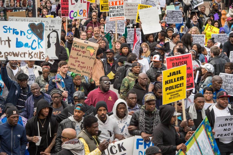 Thousands of people march through the streets of Baltimore during a demonstration on April 25, 2015, to protest the mistreatment and ultimate death of Freddie Gray while in police custody. File Photo Ken Cedeno/UPI