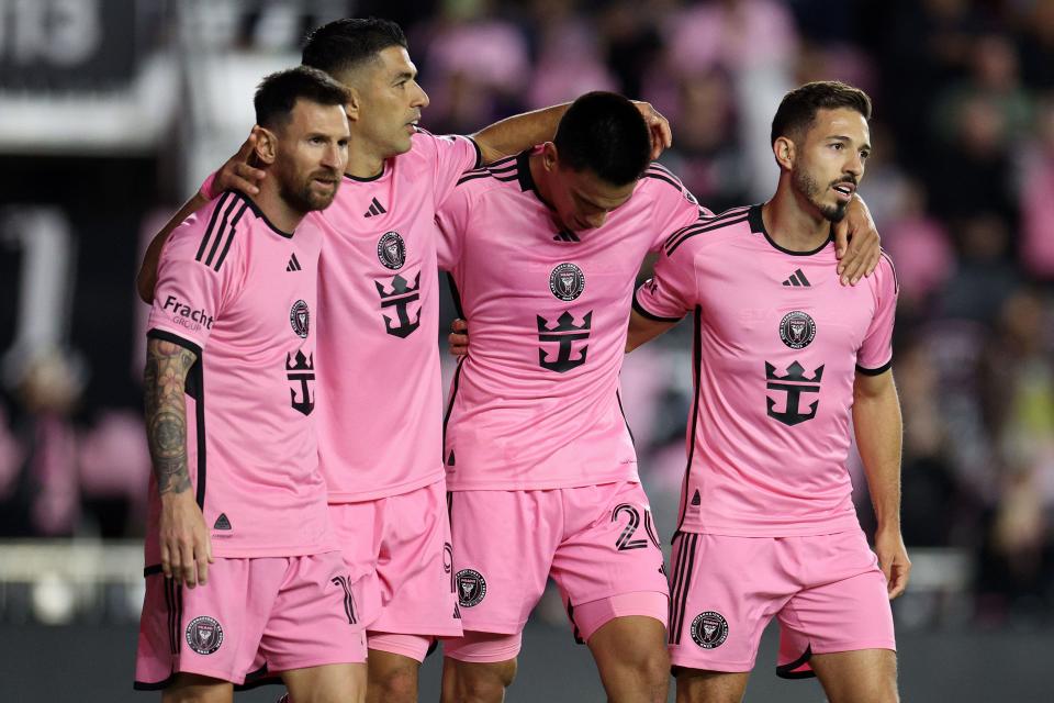 Lionel Messi celebrates a goal by teammate Diego Gomez (20), which put Inter Miami up 2-0.