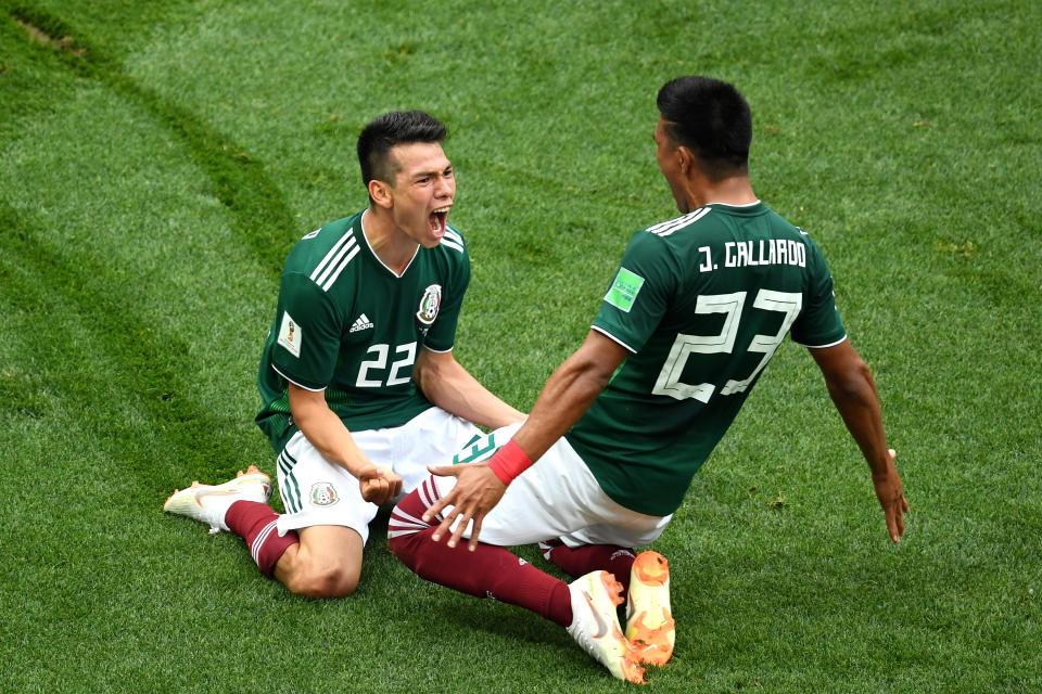 <p>Hirving Lozano of Mexico celebrates with Jesus Gallardo by sliding on their knees after scoring his team’s first goal during the 2018 FIFA World Cup Russia group F match between Germany and Mexico at Luzhniki Stadium on June 17, 2018 in Moscow, Russia. (Photo by Matthias Hangst/Getty Images) </p>