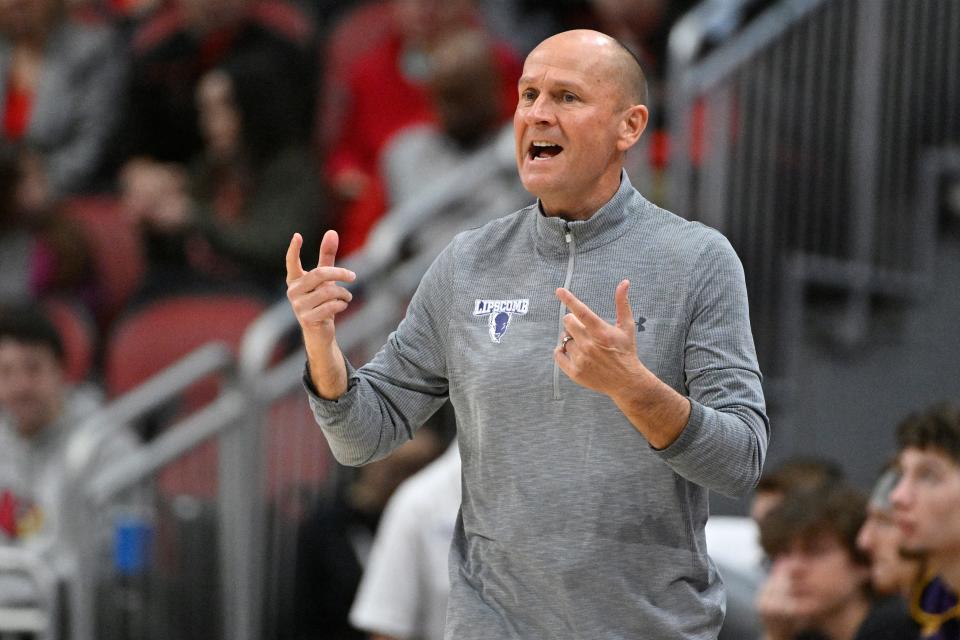 Dec 20, 2022; Louisville, Kentucky, USA; Lipscomb Bisons head coach Lennie Acuff calls out instructions during the first half against the Louisville Cardinals at KFC Yum! Center. Mandatory Credit: Jamie Rhodes-USA TODAY Sports