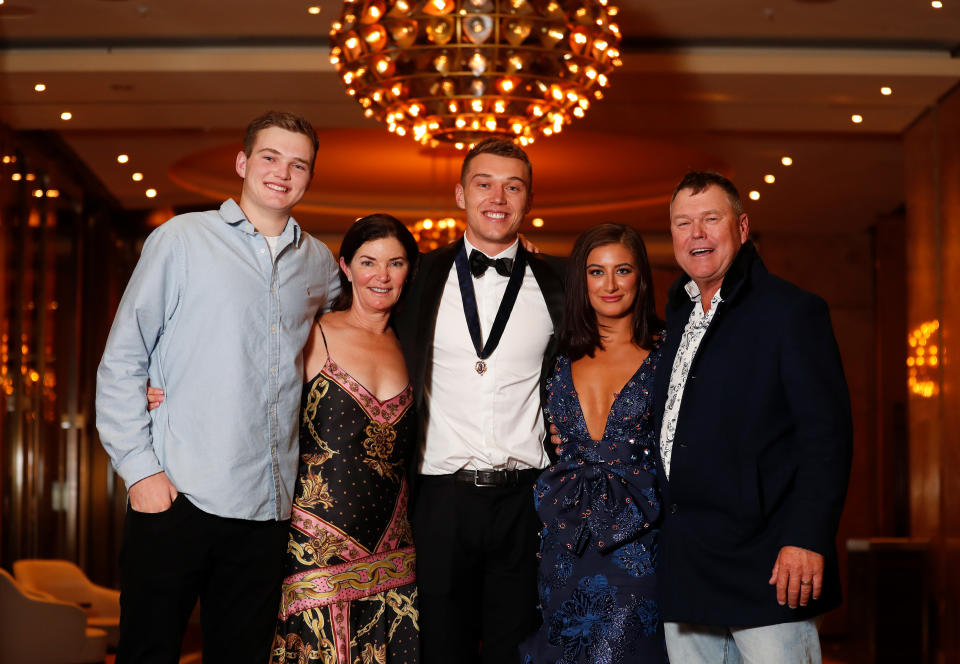 Patrick Cripps, pictured here with his family and partner after winning the Brownlow Medal.