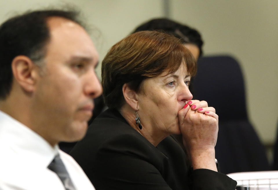 State Board of Education members Matt Navo, left, and Sue Burr, right, listen to public testimony to proposed changes to sex education guidance for teachers, Wednesday, May 8, 2019, in Sacramento, Calif. The California State Board of Education is set to vote Wednesday on new guidance for teaching sex education in public schools. The guidance is not mandatory but it gives teachers ideas about how to teach a wide range of health topic including speaking to children about gender identity. (AP Photo/Rich Pedroncelli)