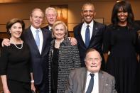 <p>At a 2018 memorial service for former First Lady Barbara Bush, her daughter-in-law (and former First Lady) Laura Bush, son President George W. Bush, President Bill Clinton, Secretary Hillary Clinton, President Barack Obama and former First Lady Michelle Obama all stood together in a show of support for Barbara's husband, President George Bush. </p>