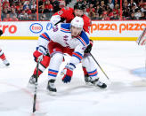 OTTAWA, CANADA - APRIL 23: Chris Kreider #20 of the New York Rangers skates while being defended by Sergei Gonchar #55 of the Ottawa Senators in Game Six of the Eastern Conference Quarterfinals during the 2012 NHL Stanley Cup Playoffs at the Scotiabank Place on April 23, 2012 in Ottawa, Ontario, Canada. The Rangers defeated the Senators 3-2. (Photo by Richard Wolowicz/Getty Images)