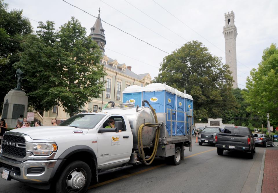 A truck load of portable toilets is brought from Frazier Disposal Company on Thursday and headed to the town-owned MacMillan Pier.  The town of Provincetown declared a sewer emergency Thursday for 356 properties on the town's vacuum sewer system.