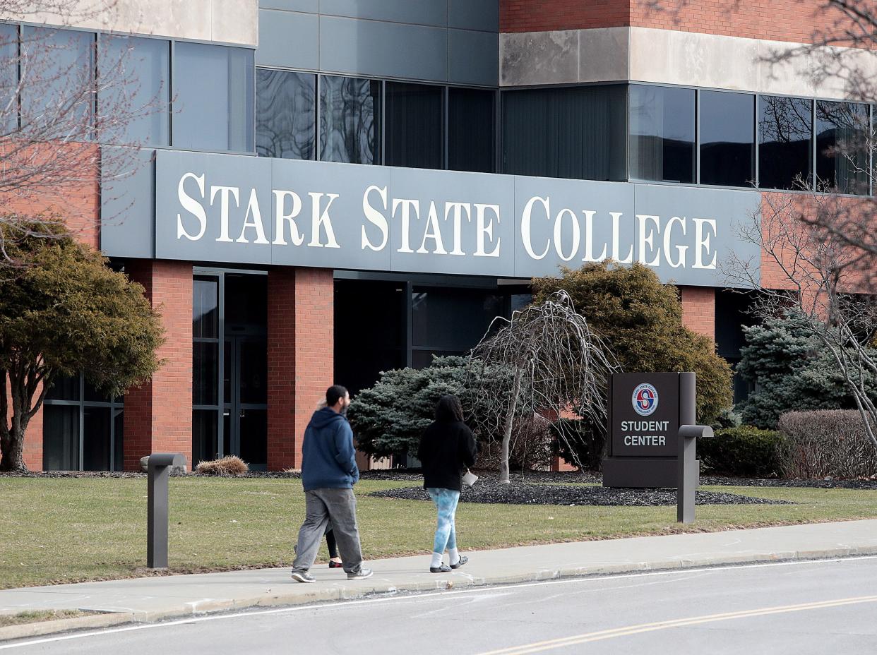 Stark State College students head to the student center Tuesday, March 15, 2022.