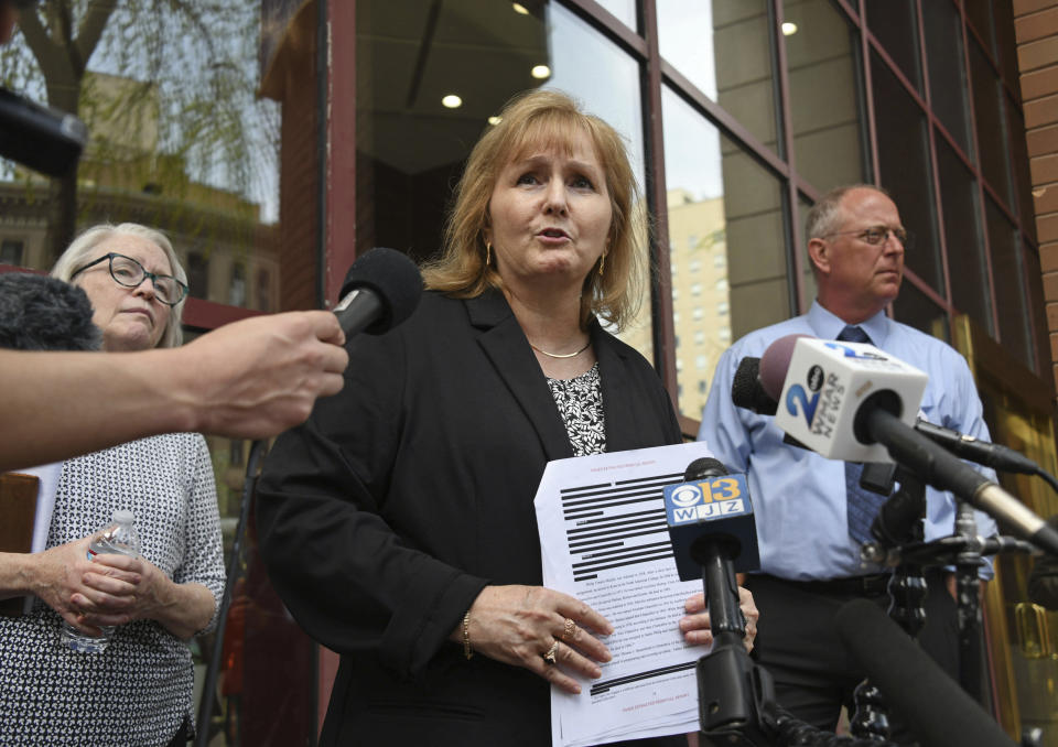 Teresa Lancaster speaks about the release of the redacted report on child sexual abuse in the Catholic Archdiocese of Baltimore by the Maryland Attorney General's Office on Wednesday, April 6, 2023, in Baltimore. (Kim Hairston/The Baltimore Sun via AP)