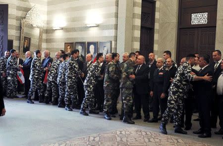 Lebanon's Prime Minister Tammam Salam and Lebanese parliament members greet Lebanese soldiers and policemen who were captured by the al Qaeda-linked Nusra Front in Arsal, after their arrival in Beirut, Lebanon December 1, 2015. REUTERS/Mohamed Azakir