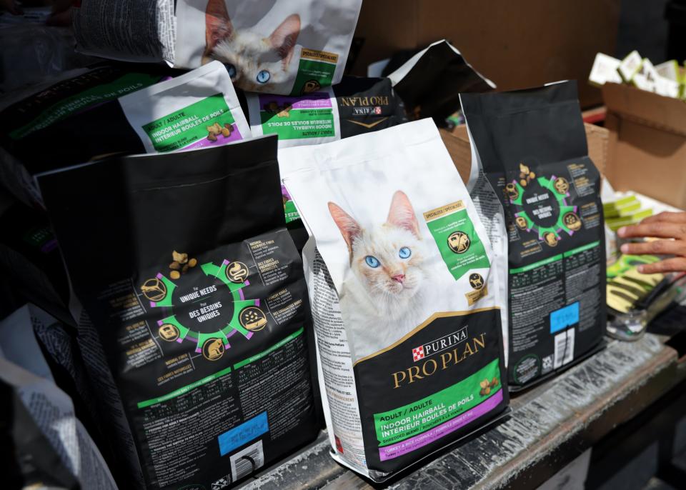 Bags of cat food and dog and cat treats sit in the Pet Food Pantry of Oklahoma awaiting distribution to pet owners in need.