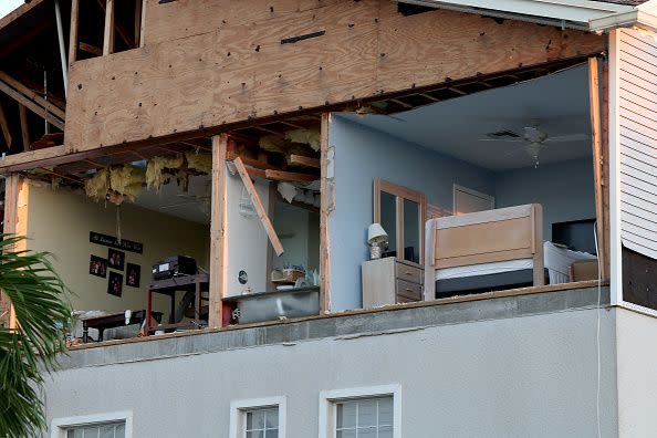 FORT MYERS, FLORIDA - SEPTEMBER 30: A wall of a condo was torn off as hurricane Ian passed through on September 30, 2022 in Fort Myers, Florida. The hurricane brought high winds, storm surge and rain to the area causing severe damage. (Photo by Joe Raedle/Getty Images)