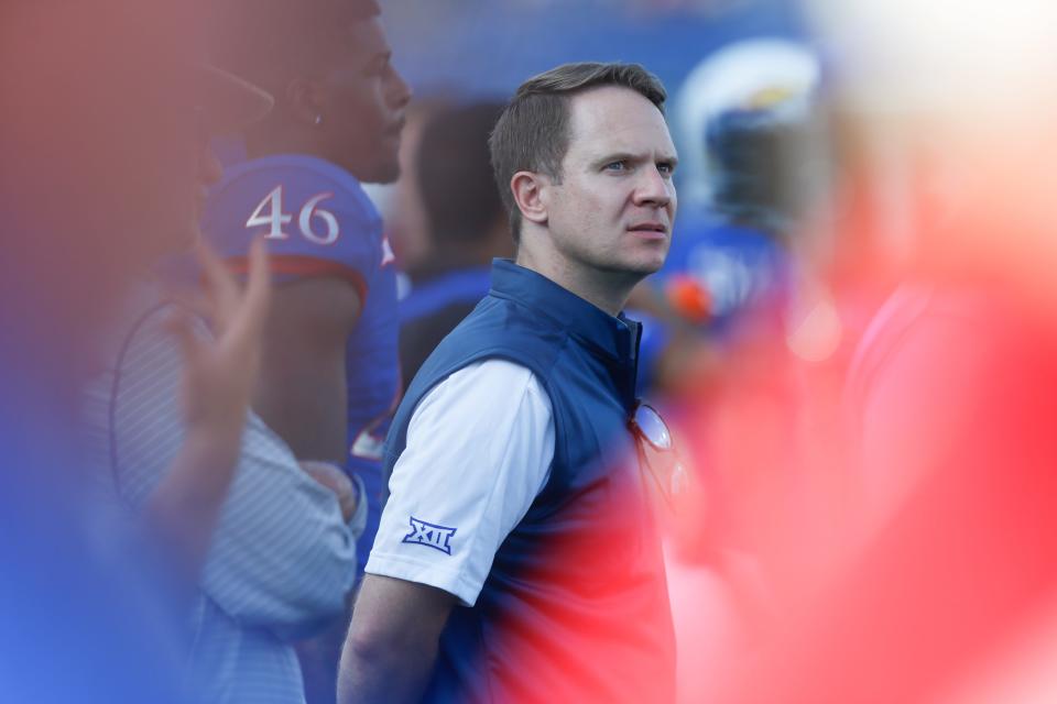 Kansas' athletic director, Travis Goff, watches from the sideline during a football game in 2021 at David Booth Kansas Memorial Stadium.
