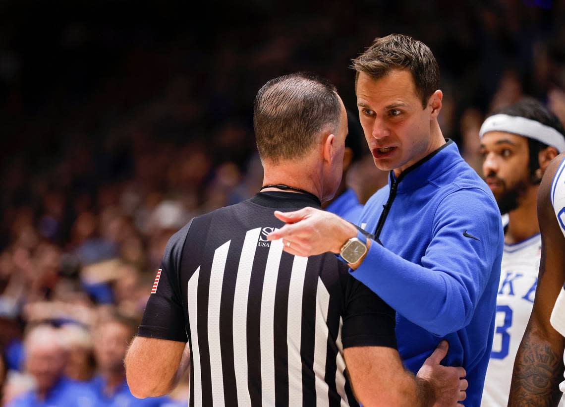 Duke head coach Jon Scheyer speaks with an official during the first half of the Blue Devils’ final regular-season home game against N.C. State on Tuesday, Feb. 28, 2023, at Cameron Indoor Stadium in Durham, N.C.