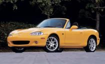 <p>Next to a handful of minor equipment changes, the 2002 MX-5 Miata lineup sees its special edition arrive with the rare (by Mazda standards) choice of two colors: Blazing Yellow Mica and Titanium Gray metallic. Both offer essentially the same equipment-a Torsen limited-slip differential, a six-speed manual transmission, white-faced gauges, and special Enkei-branded 16-inch wheels-but receive their own interior colors. The yellow car has a black interior, while the gray model wears a classy brown hue.</p>