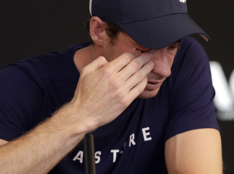 Britain's Andy Murray wipes tears from his face during a press conference at the Australian Open tennis championships in Melbourne, Australia, Friday, Jan. 11, 2019. A tearful Murray says the Australian Open could be his last tournament because of a hip injury that has hampered him for almost two years.(AP Photo/Mark Baker)