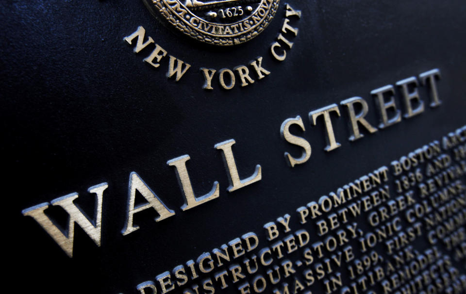 Historic marker on Wall Street in New York. (AP Photo/Mark Lennihan)