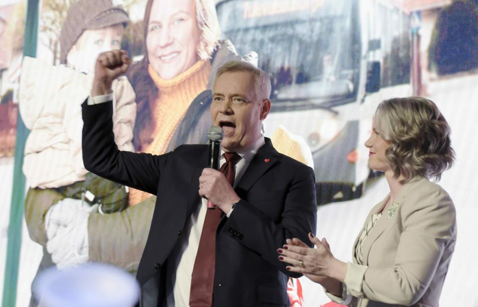 Chairman of the Finnish Social Democratic Party Antti Rinne speaks with his wife Heta Ravolainen-Rinne, right, at the parliamentary election party in Helsinki, Sunday, April 14, 2019. Voters in Finland are casting ballots in a parliamentary election Sunday after climate change dominated the campaign, even overshadowing topics like reforming the nation's generous welfare model. (Antti Aimo-Koivisto/Lehtikuva via AP)