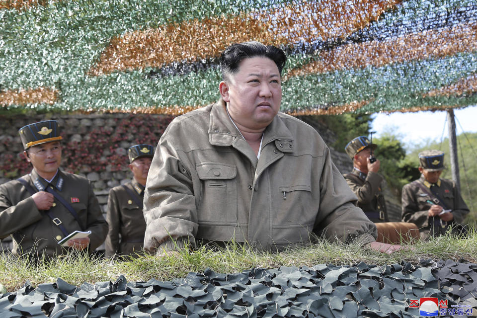 In this photo provided by the North Korean government, North Korean leader Kim Jong Un inspects military exercises at an undisclosed location in North Korea, Saturday, Oct. 8, 2022. Independent journalists were not given access to cover the event depicted in this image distributed by the North Korean government. The content of this image is as provided and cannot be independently verified. Korean language watermark on image as provided by source reads: "KCNA" which is the abbreviation for Korean Central News Agency. (Korean Central News Agency/Korea News Service via AP)