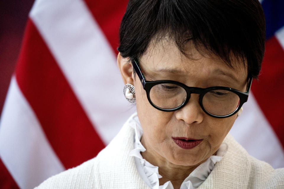Indonesia's Foreign Minister Retno Marsudi attends a meeting with U.S. State Secretary Antony Blinken during the G20 Foreign Ministers' Meeting in Nusa Dua on the Indonesian resort island of Bali Friday, July 8, 2022. (Stefani Reynolds/Pool Photo via AP)