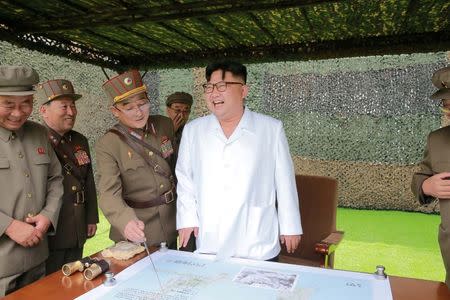 North Korean leader Kim Jong Un provides field guidance during a fire drill of ballistic rockets by Hwasong artillery units of the KPA Strategic Force, in this undated photo released by North Korea's Korean Central News Agency (KCNA) in Pyongyang September 6, 2016. KCNA/via Reuters