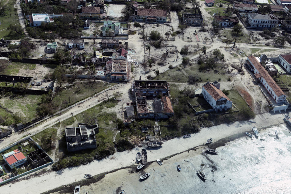 An aerial shot shows widespread destruction caused by Cyclone Kenneth when it struck Ibo island north of Pemba city in Mozambique, Wednesday, May, 1, 2019. The government has said more than 40 people have died after the cyclone made landfall on Thursday, and the humanitarian situation in Pemba and other areas is dire. More than 22 inches (55 centimeters) of rain have fallen in Pemba since Kenneth arrived just six weeks after Cyclone Idai tore into central Mozambique. (AP Photo/Tsvangirayi Mukwazhi)