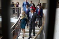 Sen. Lisa Murkowski, R-Alaska, left, and Sen. Joe Manchin, D-W.Va., head to a secure underground facility as lawmakers and intelligence advisers arrive for a closed briefing on the Chinese surveillance balloon that flew over the United States recently, at the Capitol in Washington, Thursday, Feb. 9, 2023. (AP Photo/J. Scott Applewhite)