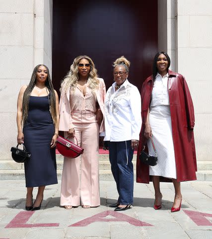 <p>Vittorio Zunino Celotto/Getty</p> Serena and Venus Williams make rare public appearance with half-sister Lyndrea Price (far left) and mom Oracene Price (center right)