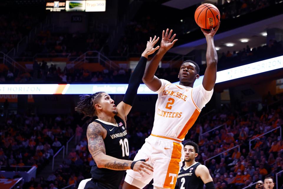 Tennessee forward Brandon Huntley-Hatfield (2) shoots as he is defended by Vanderbilt forward Myles Stute (10) during the first half of an NCAA college basketball game Saturday, Feb. 12, 2022, in Knoxville, Tenn. (AP Photo/Wade Payne)