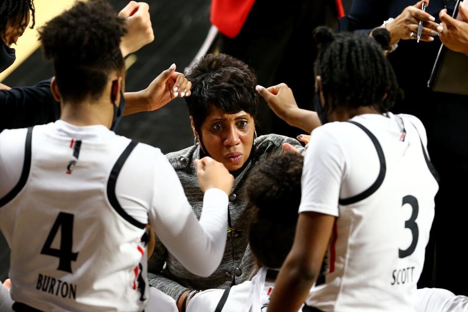 Michelle Clark-Heard is 65-54 in four seasons as Cincinnati Bearcats coach.