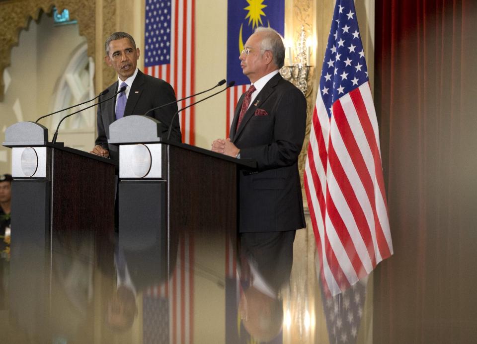 U.S. President Barack Obama and Malaysian Prime Minister Najib Razak participate in a joint news conference at the Prime Minister's Office, in Putrajaya, Malaysia, Sunday, April 27, 2014. (AP Photo/Carolyn Kaster)