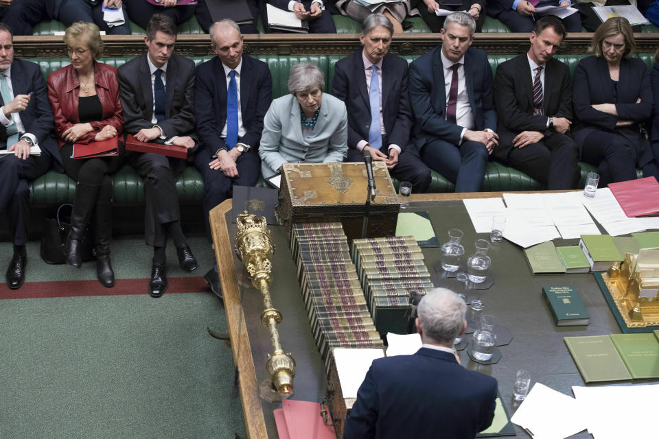 In this handout photo provided by the UK Parliament, Britain's oposition Labour party leader Jeremy Corbyn, front, makes a statement after Prime Minister Theresa May made a statement on Brexit to the House of Commons, London, Monday, March 25, 2019. British Prime Minister Theresa May conceded Monday that Parliament would defeat her twice-rejected Brexit divorce deal again if she put it to a new vote, but said she still hopes to change lawmakers' minds and get the agreement approved. (Jessica Taylor/UK Parliament via AP)