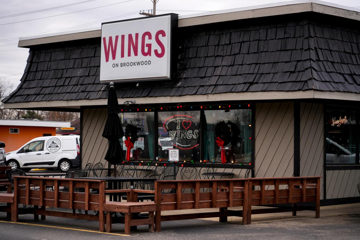 Michael Burkheimer, a regular at Wings on Brookwood, claims in 2016 he ordered boneless chicken wings from the restaurant, but ended up with a bone lodged in his esophagus. It caused an infection that has left him with a debilitating heart condition. Wings on Brookwood’s storefront in Hamilton, Ohio on Friday, Dec. 8, 2023.