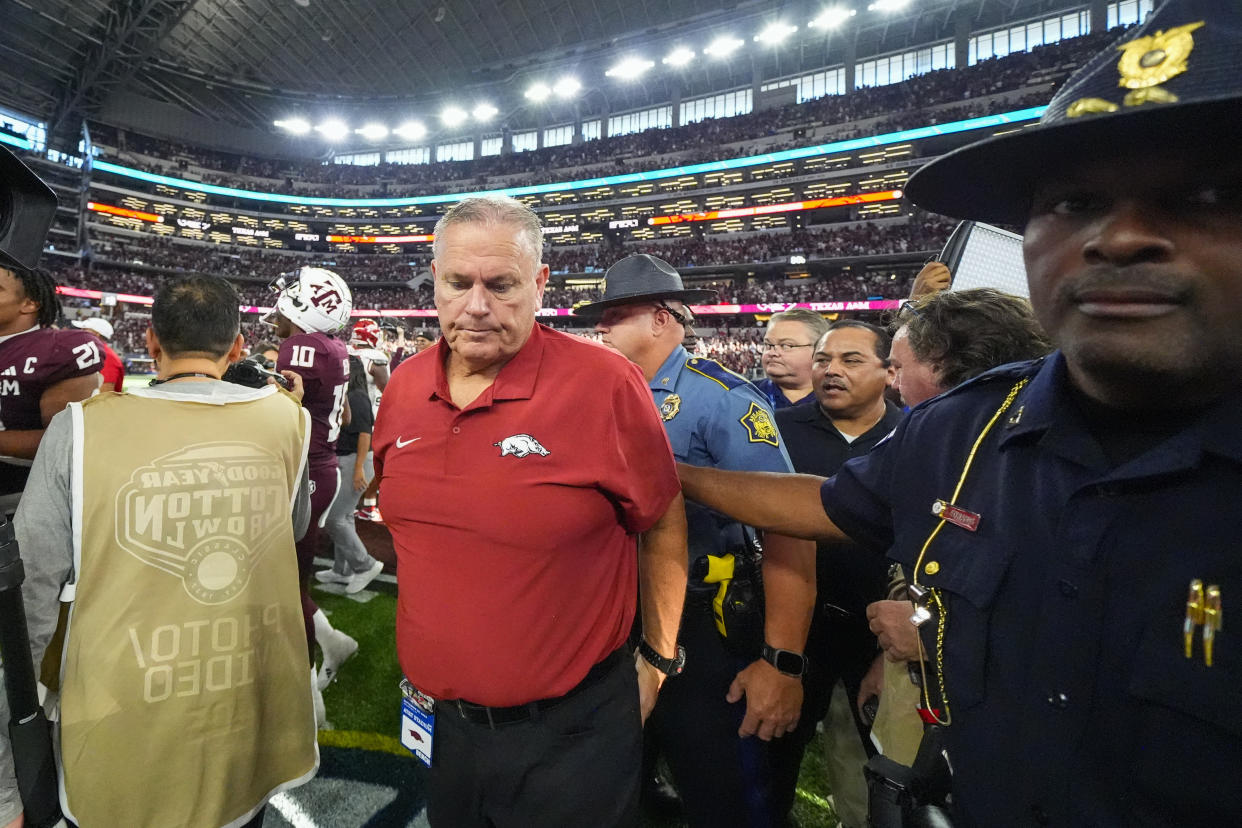 Arkansas head coach Sam Pittman walks on the field following an NCAA college football game against Texas A&M, Saturday, Sept. 28, 2024, in Arlington, Texas. Texas A&M won 21-17. (AP Photo/Julio Cortez)