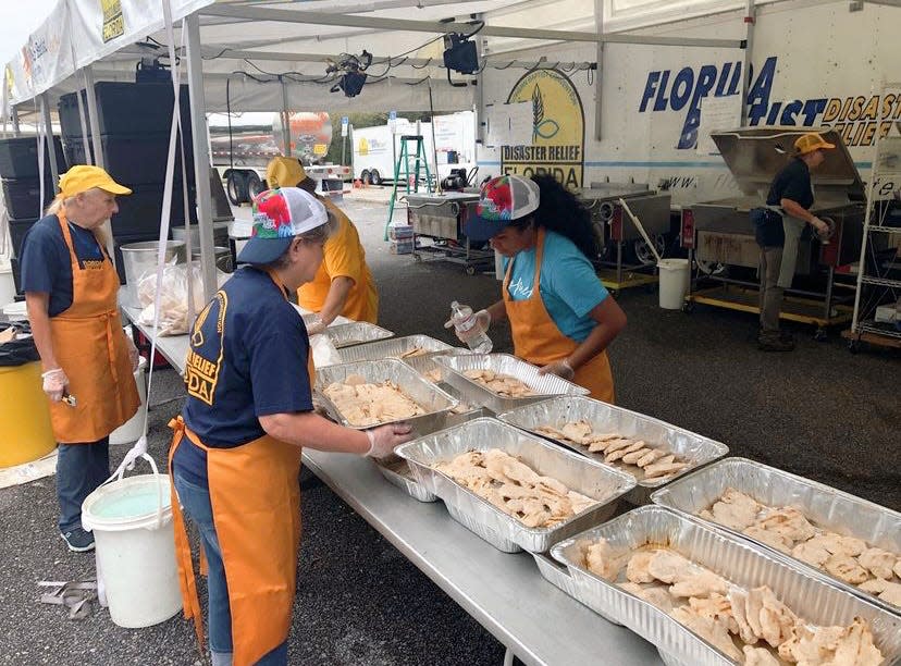 A disaster relief team from Jacksonville-based Florida Baptist Convention prepares meals for Hurricane Ian victims in Port Charlotte.