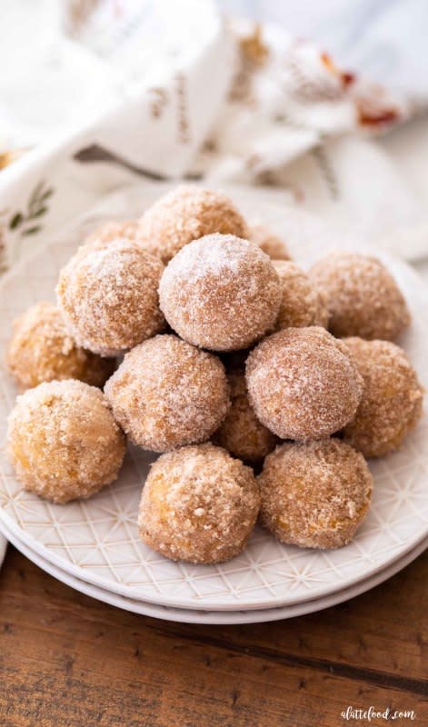 <p>A Latte Food</p><p>These homemade cinnamon sugar pumpkin donut holes are sugar, spice and absolutely nice! Baked Pumpkin Donut Holes are such a quick and easy fall dessert, and would make a perfect fall breakfast recipe. </p><p><strong>Get the recipe: <em><a href="https://www.alattefood.com/cinnamon-sugar-pumpkin-donut-holes/" rel="nofollow noopener" target="_blank" data-ylk="slk:Cinnamon Sugar Pumpkin Donut Holes;elm:context_link;itc:0;sec:content-canvas" class="link ">Cinnamon Sugar Pumpkin Donut Holes</a></em></strong></p>