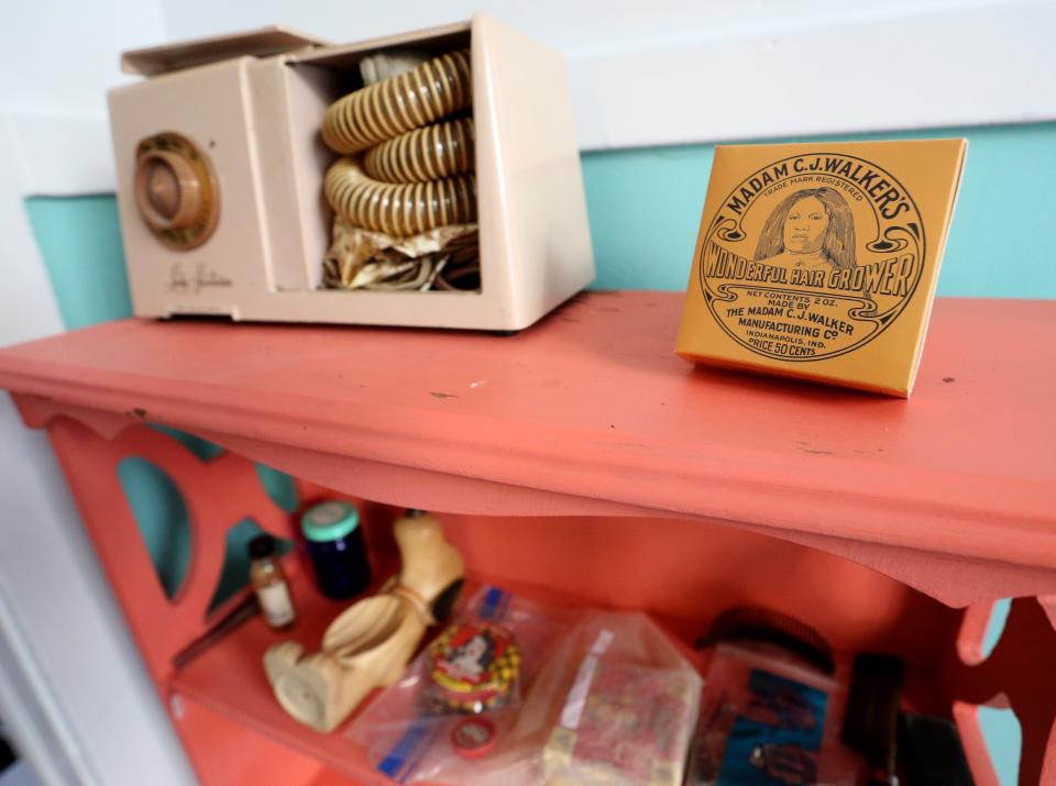 Hair care items, including Madame C.J. Walker products, are found in the bathroom of the 1950s African American Worker’s Home at The History Museum in South Bend.