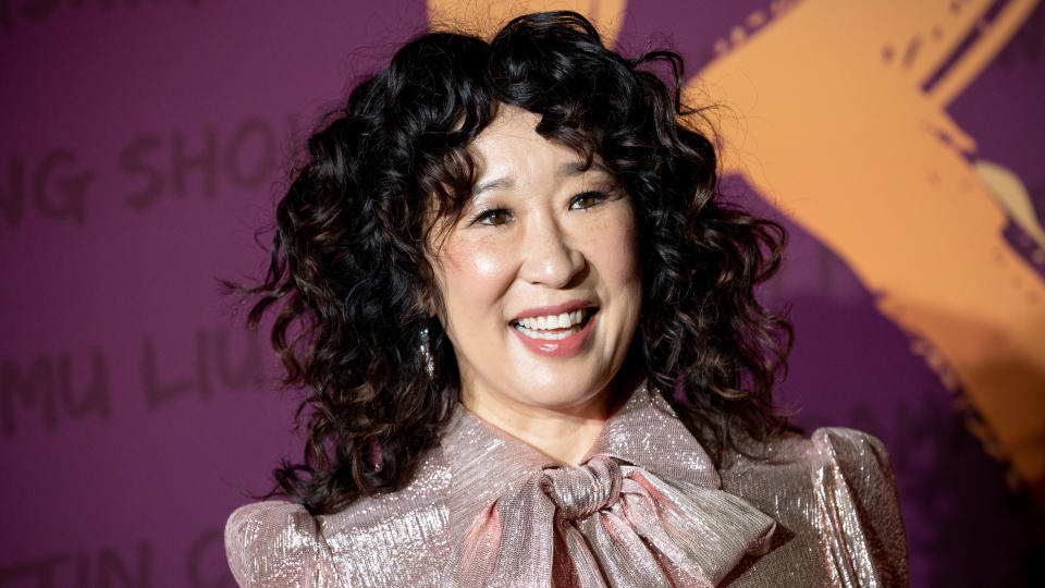 Sandra Oh with shiny, curly hair