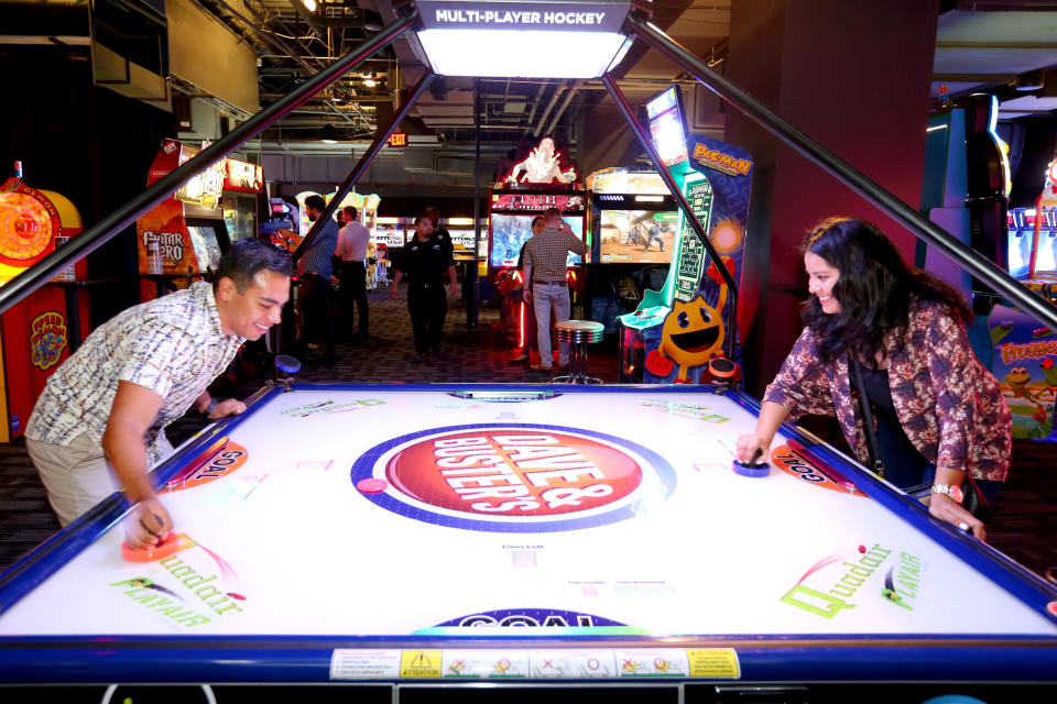 HOLLYWOOD, CA - AUGUST 21:  Guests play arcade games at Dave & Buster's Hollywood & Highland Grand Opening on August 21, 2014 in Hollywood, California.  (Photo by Mark Davis/Getty Images for Dave & Buster's)