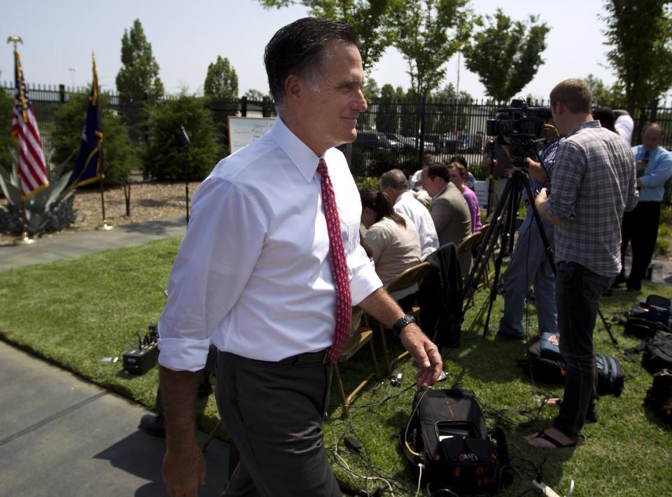 Republican presidential candidate, former Massachusetts Gov. Mitt Romney leaves after a news conference at Spartanburg International Airport, Thursday, Aug. 16, 2012, in Greer, S.C . (AP Photo/Evan Vucci)