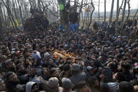 Kashmiri villagers carry body of Zahoor Ahmed, a soldier turned rebel, during his funeral in Pulwama, south of Srinagar, Indian controlled Kashmir, Saturday, Dec. 15, 2018. At least seven civilians were killed and nearly two dozens injured when government forces fired at anti-India protesters in disputed Kashmir following a gunbattle that left three rebels and a soldier dead on Saturday, police and residents said. (AP Photo/ Dar Yasin)