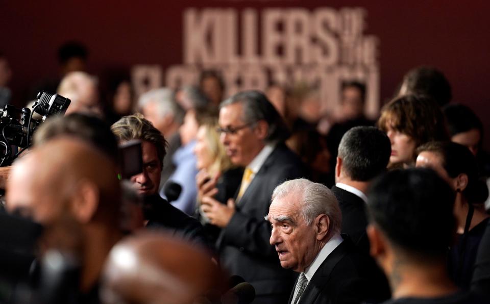 Martin Scorsese, bottom, director and co-writer of "Killers of the Flower Moon," works the press line at the Los Angeles premiere of the film, Monday, Oct. 16, 2023, at the Dolby Theater.