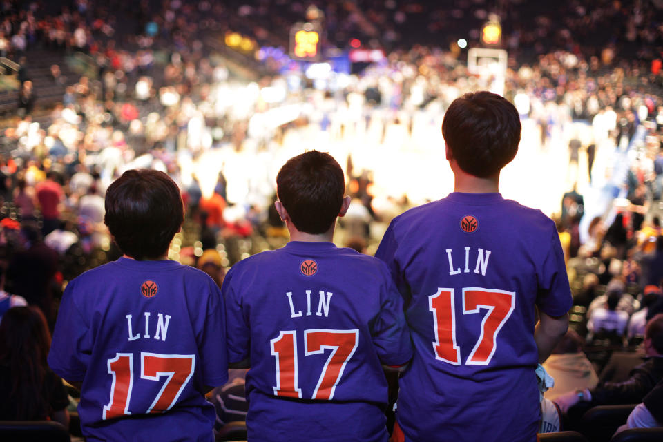 Jeremy Lin fans at Knicks game in 2012 (Jeyhoun Allebaugh / NBAE via Getty Images)