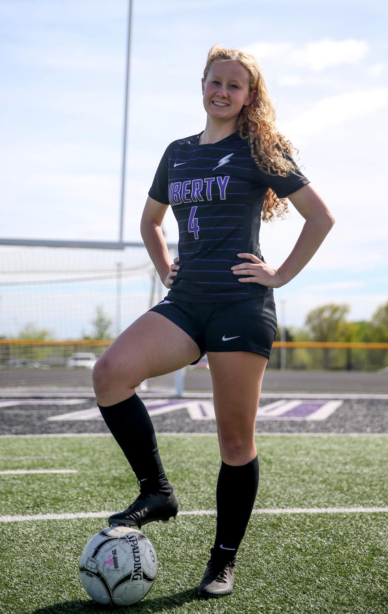 Rilyn Breinholt poses for a portrait at Liberty High School in North Liberty, Iowa.