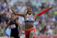 FILE - In this June 26, 2021, file photo, Gabby Thomas celebrates after winning the final in the women's 200-meter run at the U.S. Olympic Track and Field Trials in Eugene, Ore. Harvard-educated sprinter Thomas could make headlines in the 200 at the upcoming Tokyo Games. (AP Photo/Ashley Landis, File)