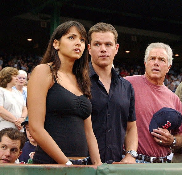 the couple is at a red sox game